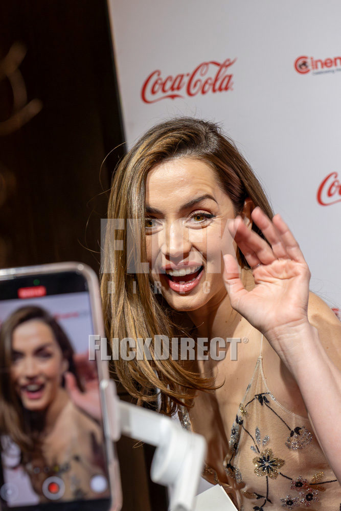 Ana de Armas waving to the crowd at CinemaCon in Las Vegas